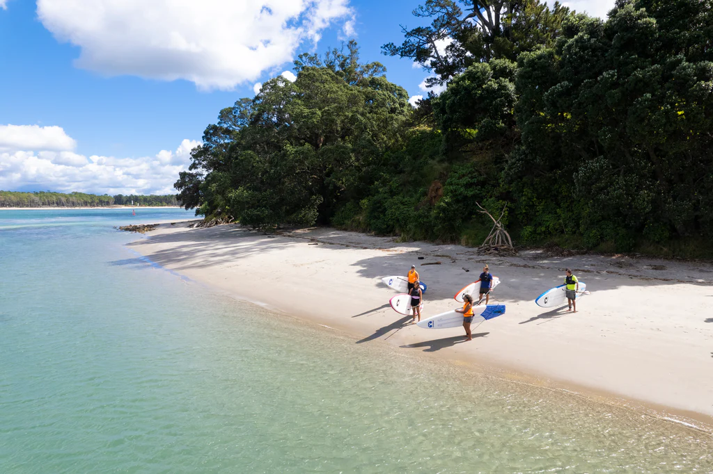 hire a stand up surf board at Polite Bay New Zealand