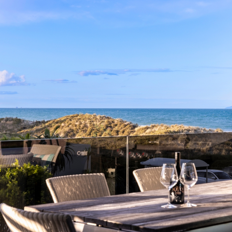 wine glasses and ocean views at 2/415 oceanbeach