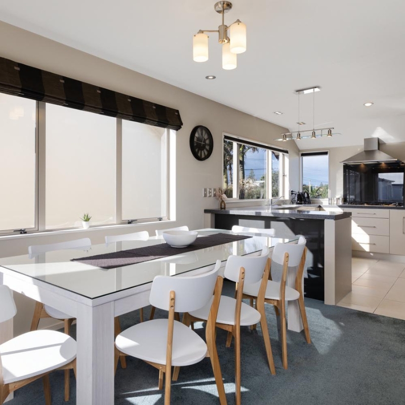 kitchen and dining room in mt maunganui accommodation